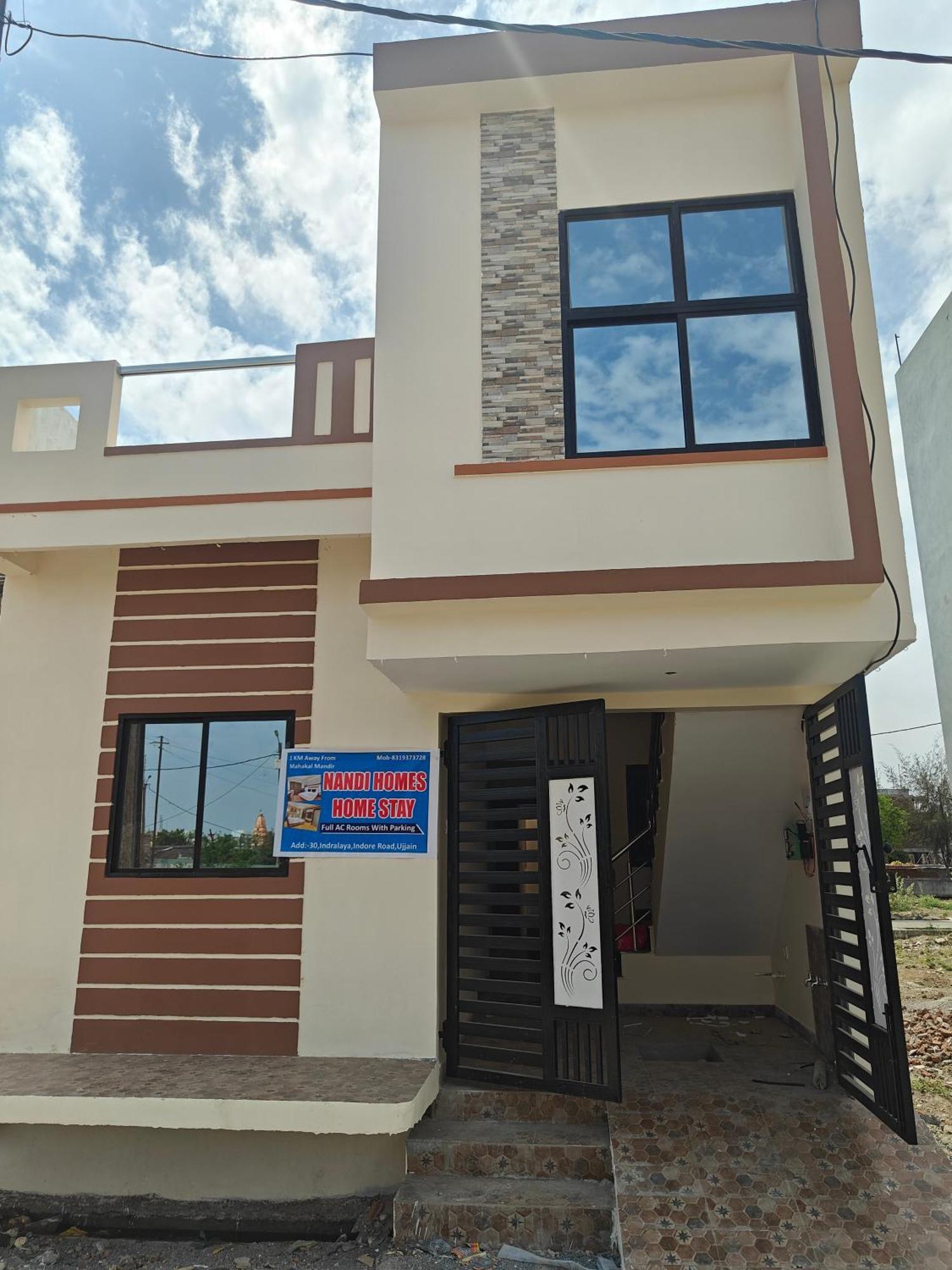 Nandi Homes Homestay Ujjain Extérieur photo